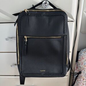 Calpak Black Backpack with Gold Zippers